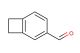 bicyclo[4.2.0]octa-1(6),2,4-triene-3-carbaldehyde