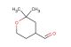 2,2-dimethyloxane-4-carbaldehyde
