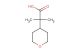 2-methyl-2-(oxan-4-yl)propanoic acid
