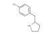 2-[(4-bromophenyl)methyl]pyrrolidine