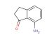 7-amino-2,3-dihydroinden-1-one