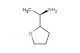 (1R)-1-(tetrahydrofuran-2-yl)ethan-1-amine