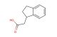 2-(2,3-dihydro-1H-inden-1-yl)acetic acid